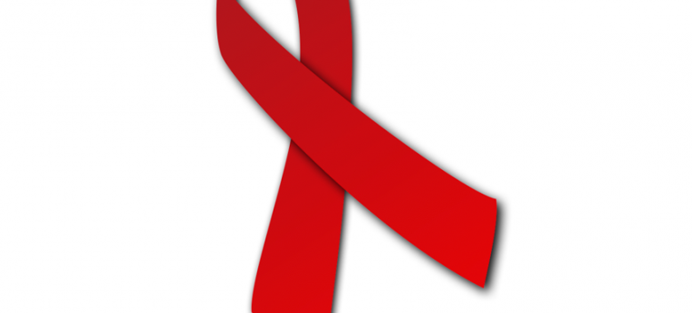 Die Rote Schleife als Symbol der Solidarität mit HIV-positiven und AIDS-kranken Menschen
