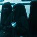 Drei Frauen im Niqab